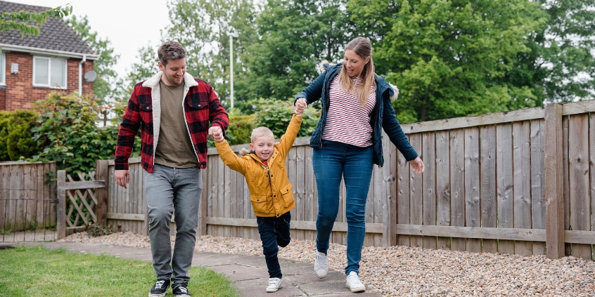 A family walking down a path.