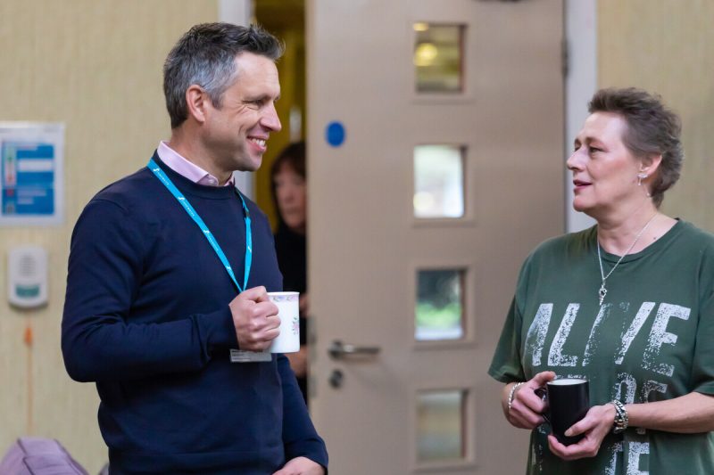 Viv, a member of Stonewater customer Scrutiny Panel talking to Jonathan Layzell, Chief Executive of Stonewater