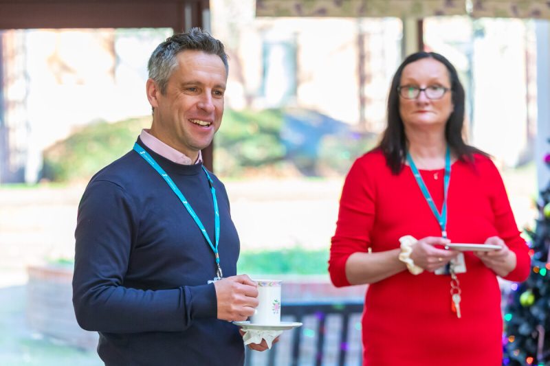 Jonathan Layzell, Chief Executive of Stonewater with a retirement living scheme manager in Nottingham