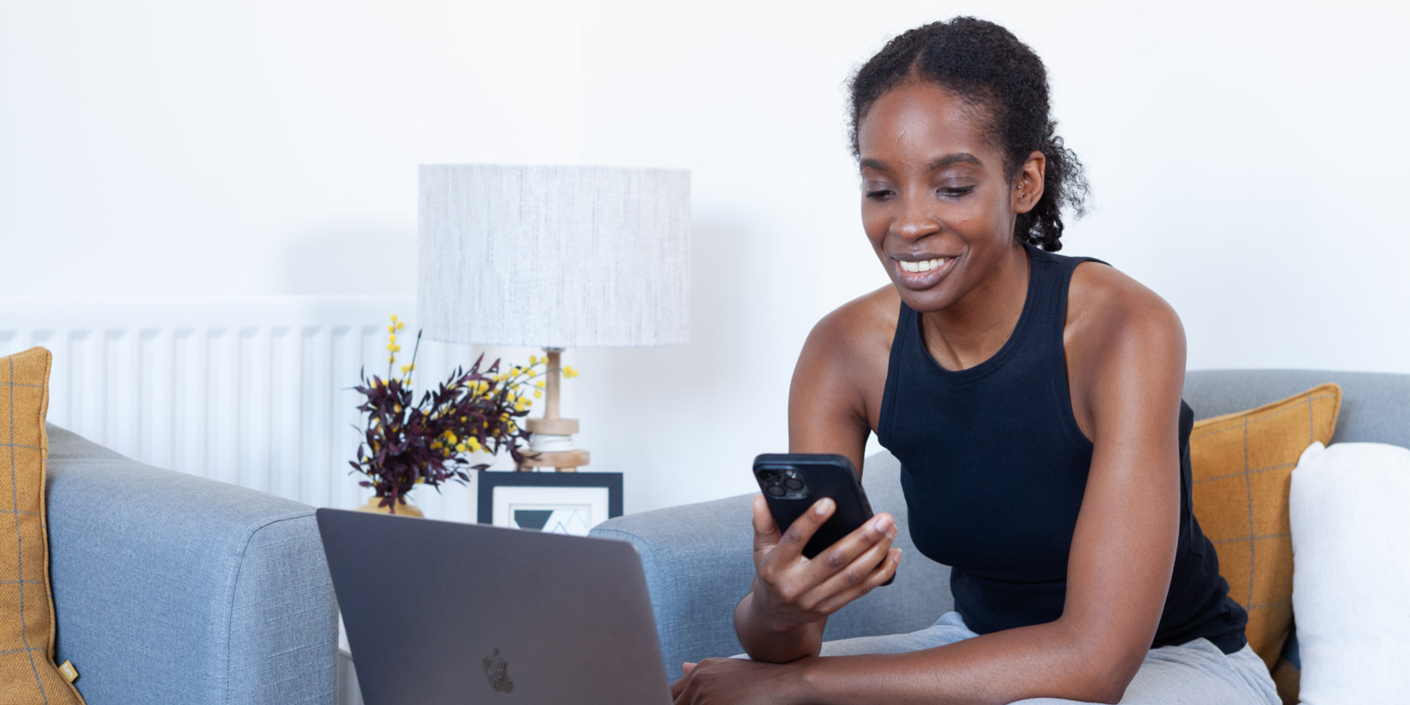Woman holding a phone.