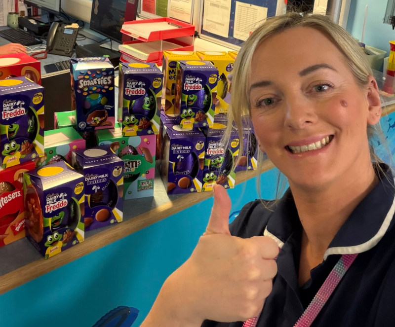 Ellie from Bell Group with Easter egg donation.